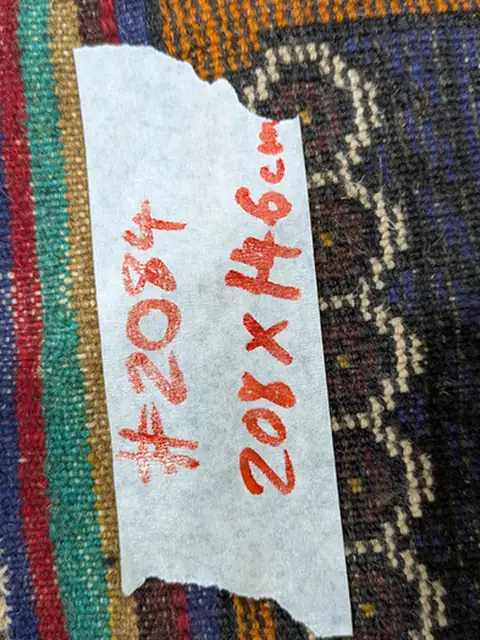 The back of rug 2084 with its size tag